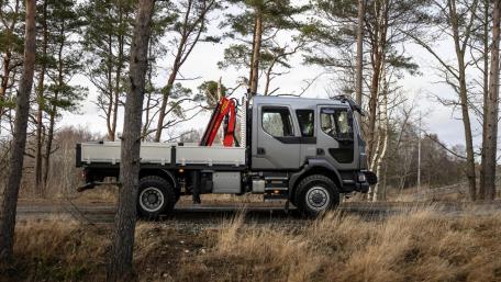 Volvo Truck in Serene Woodland Setting wallpaper