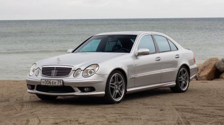 Timeless Elegance Silver Mercedes-Benz by the Sea wallpaper