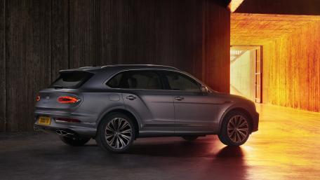 Luxurious Elegance in Motion Bentley Bentayga SUV wallpaper