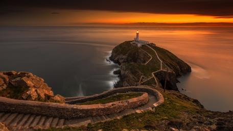 South Stack Lighthouse at Sunset Serenity wallpaper