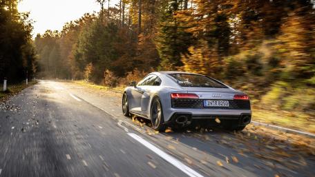 Sleek Audi R8 in Autumn Roadscape wallpaper