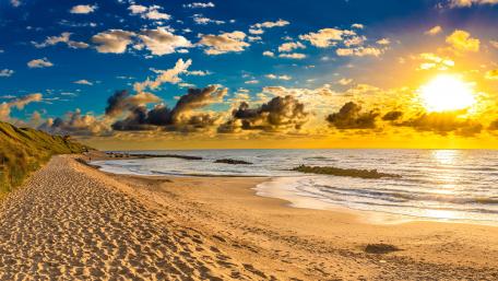 Serene Sunset at Thy National Park Shoreline wallpaper
