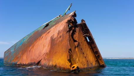 Shipwreck Beauty Amidst Blue Waters wallpaper