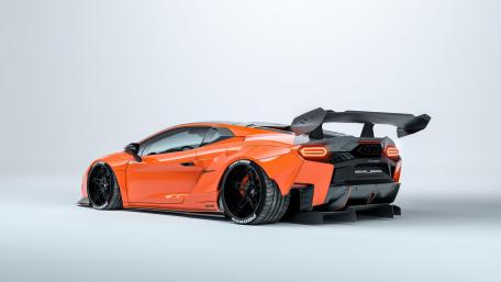 Dynamic Orange Speed Machine on White Canvas wallpaper
