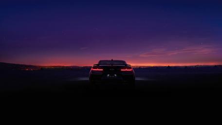 Midnight Journey in a Chevrolet Camaro wallpaper
