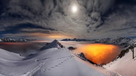 Majestic Peaks Under a Moonlit Sky wallpaper