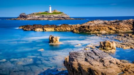 Serenity by the Sea Godrevy Lighthouse Views wallpaper