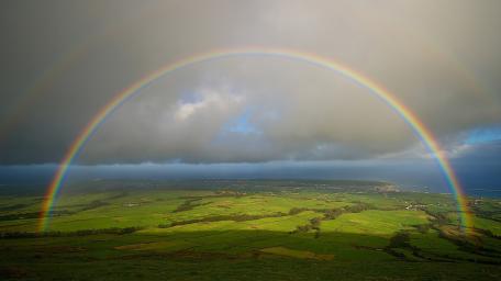 Rainbow Stretching Across Verdant Fields wallpaper