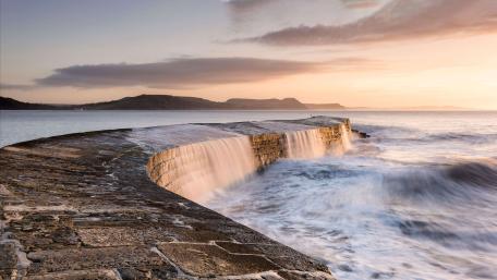 Serene Sunset by the Sea at The Cobb wallpaper