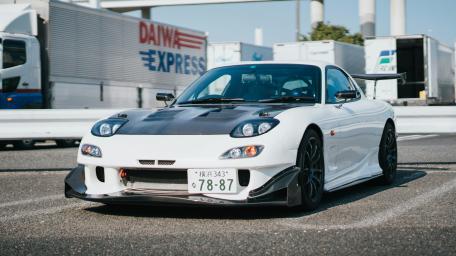 Mazda RX-7 in Urban Tokyo Setting wallpaper