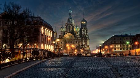 Enchanting Cityscape of St. Petersburg's Illuminated Cathedral wallpaper