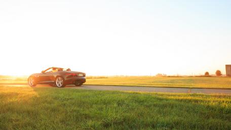 Sunset Drive in a Stylish Convertible wallpaper