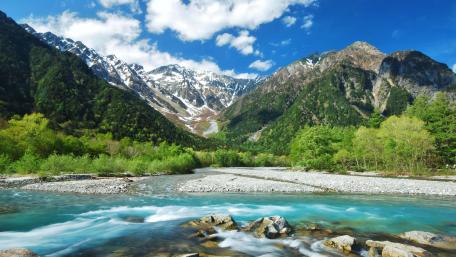 Serenity Amidst Majestic Mountains in Kamikochi Japan wallpaper