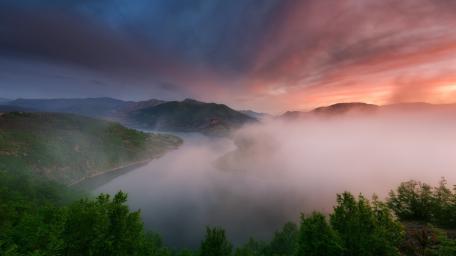 Misty Sunrise Over Serene River wallpaper