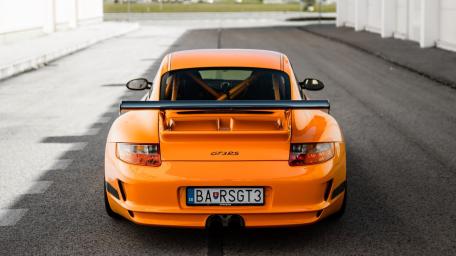 Vibrant Orange Porsche GT3 Wallpaper wallpaper