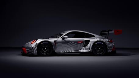 Sleek Sports Car Elegance in Motion wallpaper
