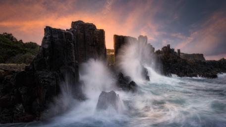 Majestic Coastal Crags at Sunset wallpaper