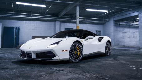 White Ferrari 488 in Urban Shelter wallpaper