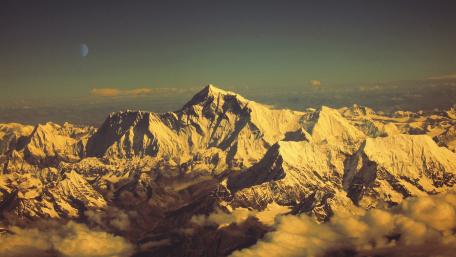 Majestic Serenity of Himalayan Peaks Under Moonlight wallpaper