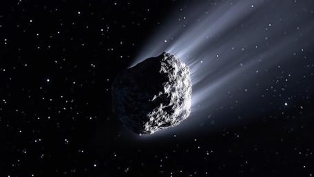 Ethereal Frozen Comet Gliding Through Space wallpaper