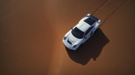 Gemballa Marsien Carving Silent Lines Across Desert Dunes wallpaper