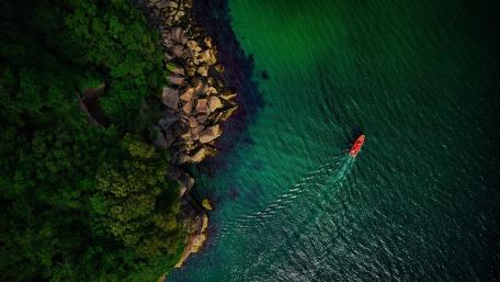Aerial Serenity Over Anstey's Cove Devon Coast wallpaper