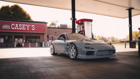 Mazda RX-7 Street Legend at a Quiet Gas Station wallpaper