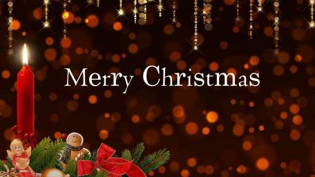 Warm Merry Christmas Candlelight with Golden Bokeh and Sparkling Ornaments wallpaper