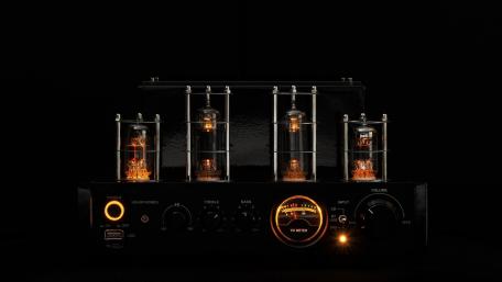 Glowing Vacuum Tube Amplifier in Dark Studio Atmosphere wallpaper