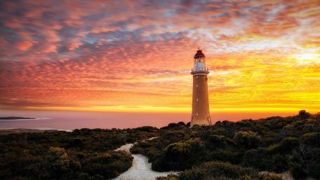 Cape du Couedic Lighthouse Under Fiery Australian Sunset Skies wallpaper
