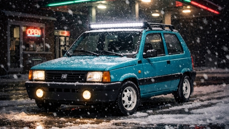 Snowy Night Stop with a Classic Fiat Panda at the Gas Station wallpaper