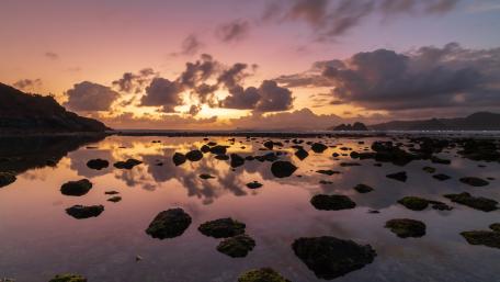 Sunset Reflections at Pantai Mawi Beach Lombok Indonesia 5K Wallpaper wallpaper