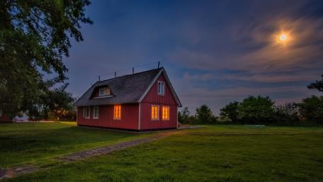 Charming Nighttime Cottage in Zingst Germany wallpaper