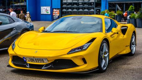 Sunlit Yellow Ferrari F8 Supercar in Crisp 5K Detail wallpaper