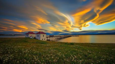 Dusk Skies Over The Singular Patagonia Pier In Puerto Bories Chile wallpaper