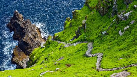 Emerald Cliffs Above the Atlantic at Great Skellig Ireland wallpaper