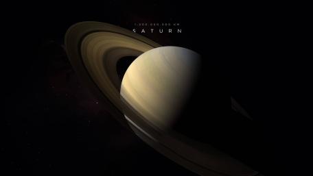Shadowed Saturn and Golden Rings in Deep Space wallpaper