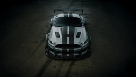 Shadowlit Shelby GT500 Mustang in Dark 5K Garage Scene wallpaper