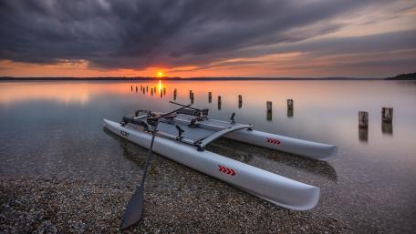 Catamaran at Sunset on Starnberger See 4K Serenity wallpaper