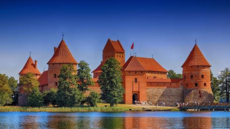 Trakai Island Castle Reflections Over Lake Galve in Lithuania wallpaper
