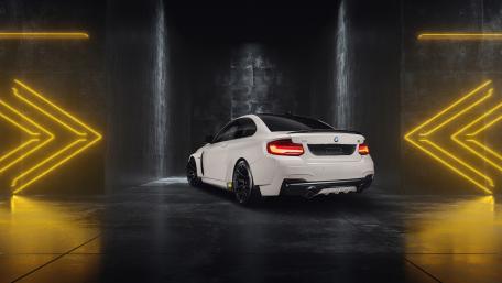 White BMW M Coupe in Neon Arrow Garage Nightscape wallpaper