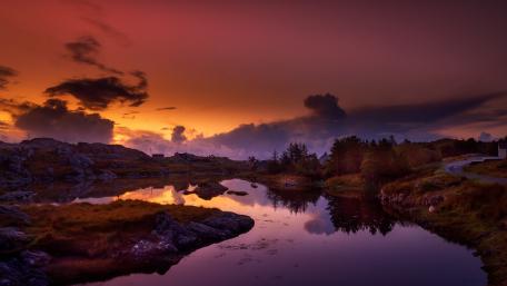 Twilight Stormlight Over a Silent Lakeside Valley wallpaper