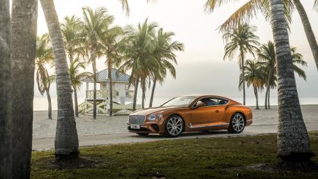 Bentley Continental GT Luxury Coupe by the Palm Lined Shore wallpaper