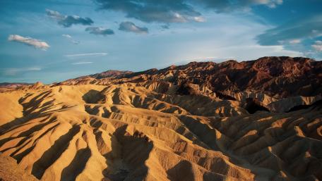 Golden Badlands Panorama from Zabriskie Point in Death Valley National Park wallpaper