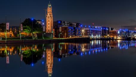 Simon Loschen Tower Reflections Over Bremerhaven Harbor at Night wallpaper