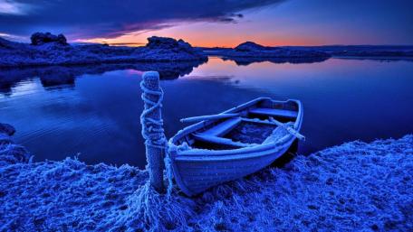 Frozen Boat at Blue Hour on a Silent Winter Lake wallpaper