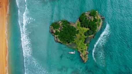 Heart Shaped Island Aerial View in Turquoise Ocean Serenity wallpaper