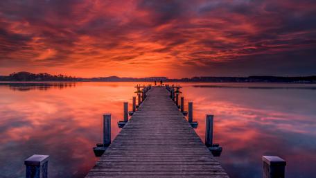 Burning Sunset Over Wörthsee Pier Tranquil 4K Lake Wallpaper wallpaper