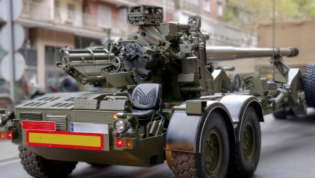 5K Field Artillery Cannon in Urban Street Display wallpaper