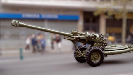 Field Artillery Cannon in Urban Display 5K Wallpaper wallpaper